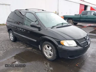 2007 Dodge Caravan SXT with VIN 1D4GP45R87B161237, listed as a IAAI auction lot 41594127 with 154,508 mi miles. Bid and sale history available at carsss.com. Image 1.