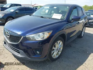 2014 Mazda CX-5 Grand Touring with VIN JM3KE4DYXE0342720, listed as a IAAI auction lot 42026388 with 114,072 mi miles and . Bid and sale history available at carsss.com. Image 18.