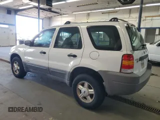 2001 Ford Escape XLS with VIN 1FMYU01181KF33553, listed as a Copart auction lot 52991765 with 214,453 mi miles and Clean Title. Bid and sale history available at carsss.com. Image 2.