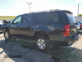 2013 Chevrolet Suburban LT with VIN 1GNSKJE70DR138631, listed as a Copart auction lot 57778185 with 176,934 mi miles and Salvage title. Bid and sale history available at DreamBid. Image 2.