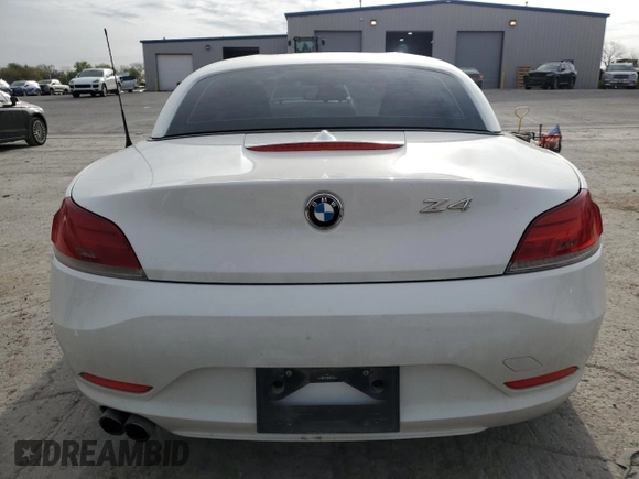 2011 BMW Z4 sDrive30i с VIN WBALM5C57BE379684, выставлен на аукционе Copart как лот 51287295 с пробегом 79 668 миль миль и Списание • Salvage title. История ставок и продаж доступна на DreamBid. Изображение 6.