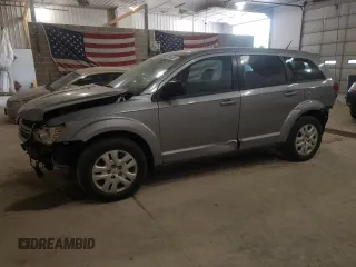2015 Dodge Journey American Value z VIN 3C4PDCAB5FT595508, wystawiony jako Copart lot #57096735 z przebiegiem 172 662 mil mil oraz Czysty tytuł • Clean title. Historia ofert i sprzedaży dostępna na DreamBid. Obrazek 1.
