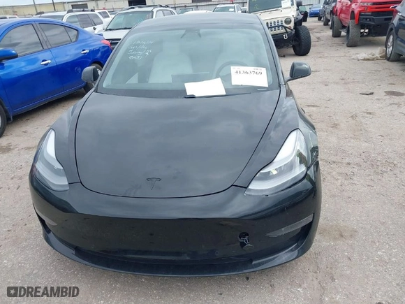 2021 Tesla Model 3 Performance with VIN 5YJ3E1EC0MF925439, listed as a IAAI auction lot 41363769 with 60,503 mi miles. Bid and sale history available at carsss.com. Image 12.