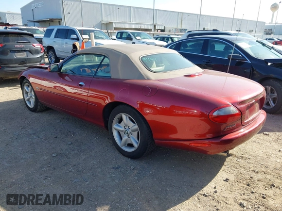 1997 Jaguar XK with VIN SAJGX2748VC011754, listed as a IAAI auction lot 41979459 with 34,601 mi miles and . Bid and sale history available at DreamBid. Image 3.