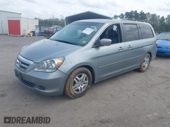 2007 Honda Odyssey EX-L z VIN 5FNRL38757B046761, wystawiony jako IAAI lot #41943033 z przebiegiem 309 270 mil mil oraz . Historia ofert i sprzedaży dostępna na DreamBid. Obrazek 2.