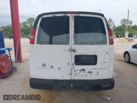 2011 Chevrolet Express Cargo with VIN 1GCWGGCA3B1127003, listed as a IAAI auction lot 42380652 with 158,049 mi miles and . Bid and sale history available at DreamBid. Image 17.