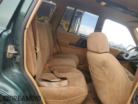 1996 Jeep Grand Cherokee Laredo with VIN 1J4GZ58S6TC165636, listed as a Copart auction lot 51485235 with 266,873 mi miles and Salvage Title. Bid and sale history available at carsss.com. Image 10.