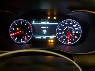 2021 Genesis G70 2.0T z VIN KMTG34LA4MU072420, wystawiony jako Copart lot #87259094 z przebiegiem 36 491 mil mil oraz Szkoda całkowita • Salvage title. Historia ofert i sprzedaży dostępna na DreamBid. Obrazek 9.