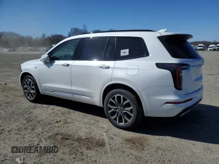 2025 Cadillac XT6 AWD Sport z VIN 1GYKPHRS5SZ101521, wystawiony jako Copart lot #48552185 z przebiegiem 262 mil mil oraz Szkody całkowita. Historia ofert i sprzedaży dostępna na DreamBid. Obrazek 2.