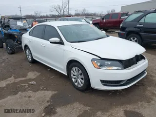 2014 Volkswagen Passat Wolfsburg Ed with VIN 1VWAS7A30EC119833, listed as a IAAI auction lot 41429589 with 181,630 mi miles. Bid and sale history available at carsss.com. Image 1.