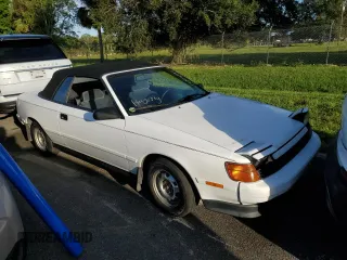 1989 Toyota Celica z VIN JT5ST62K8K7343548, wystawiony jako Copart lot #73774594 z przebiegiem 87 477 mil mil oraz Szkoda całkowita • Salvage title. Historia ofert i sprzedaży dostępna na DreamBid. Obrazek 4.