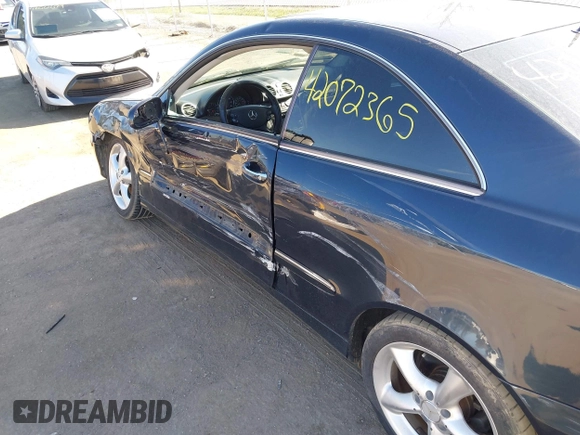 2004 Mercedes-Benz CLK 3.2L with VIN WDBTJ65J44F084713, listed as a IAAI auction lot 42072365 with 127,824 mi miles. Bid and sale history available at carsss.com. Image 6.