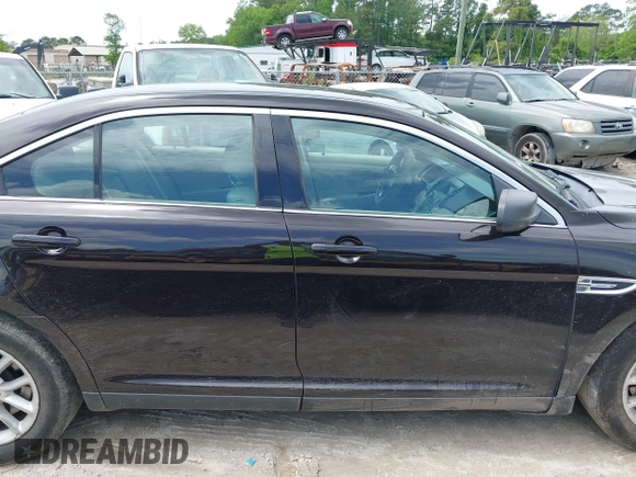 2014 Ford Taurus SE z VIN 1FAHP2D81EG140072, wystawiony jako IAAI lot #42124900 z przebiegiem 116 560 mil mil oraz . Historia ofert i sprzedaży dostępna na DreamBid. Obrazek 13.
