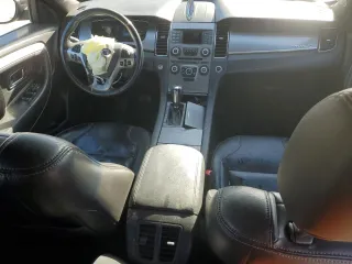 2014 Ford Taurus SEL with VIN 1FAHP2E88EG179093, listed as a Copart auction lot 50060975 with 198,096 mi miles and Salvage Title. Bid and sale history available at carsss.com. Image 8.