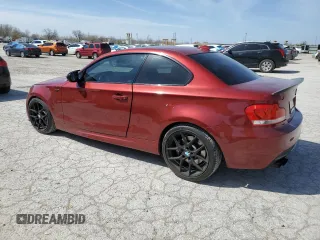 2012 BMW 1 Series 135i with VIN WBAUC9C5XCVM12726, listed as a Copart auction lot 48102254 with 82,285 mi miles and Salvage title. Bid and sale history available at DreamBid. Image 2.