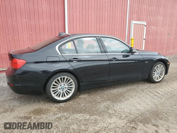 2012 BMW 3 Series 328i with VIN WBA3A5C57CF345040, listed as a Copart auction lot 63761735 with 106,665 mi miles and Clean title. Bid and sale history available at DreamBid. Image 3.