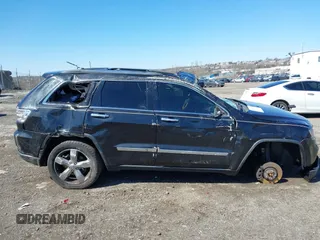 2013 Jeep Grand Cherokee Overland with VIN 1C4RJFCT2DC536899, listed as a IAAI auction lot 41853217 with 1 mi miles. Bid and sale history available at carsss.com. Image 12.