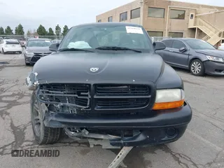 2004 Dodge Dakota with VIN 1D7FL16K64S578877, listed as a IAAI auction lot 41568126 with 93,657 mi miles. Bid and sale history available at carsss.com. Image 12.