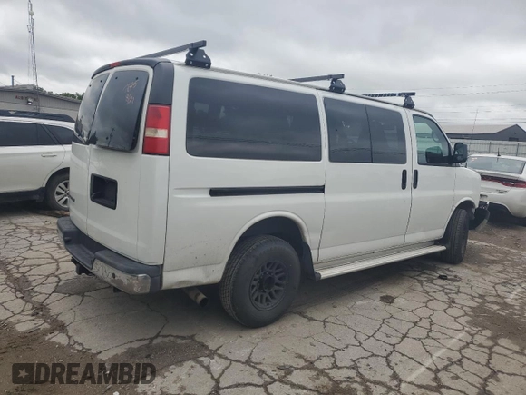 2014 Chevrolet Express Passenger 1LT with VIN 1GAZGYFG9E1207695, listed as a Copart auction lot 62146754 with 108,836 mi miles and Salvage title. Bid and sale history available at DreamBid. Image 3.