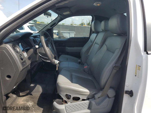 2014 Ford F-150 XL with VIN 1FTMF1CM7EKF39988, listed as a Copart auction lot 51571215 with 129,199 mi miles and Salvage Title. Bid and sale history available at carsss.com. Image 7.