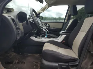 2007 Mercury Mariner Luxury with VIN 4M2YU91137KJ11539, listed as a Copart auction lot 64846175 with 139,488 mi miles and Salvage title. Bid and sale history available at DreamBid. Image 7.