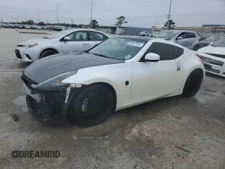 2010 Nissan 370Z with VIN JN1AZ4EH9AM506522, listed as a Copart auction lot 85807034 with 131,357 mi miles and Salvage Title. Bid and sale history available at carsss.com. Image 1.
