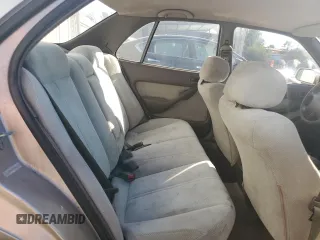 1994 Toyota Camry LE z VIN JT2GK12EXR0070117, wystawiony jako Copart lot #75997244 z przebiegiem 185 759 mil mil oraz Czysty tytuł • Clean title. Historia ofert i sprzedaży dostępna na DreamBid. Obrazek 10.