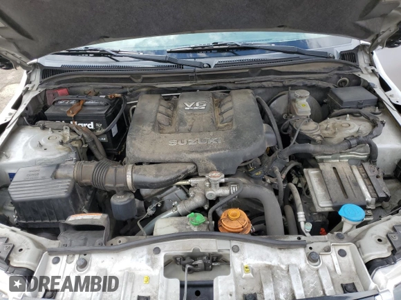 2008 Suzuki Grand Vitara w/Spare & Cargo Covers with VIN JS3TD941784100899, listed as a Copart auction lot 62581725 with 104,502 mi miles and Salvage title. Bid and sale history available at DreamBid. Image 11.