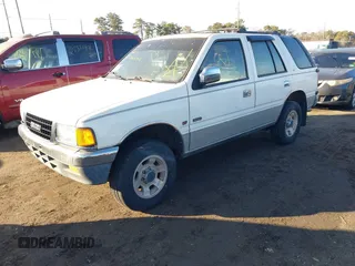 1994 Isuzu Rodeo LS z VIN 4S2CG58V5R4332970, wystawiony jako IAAI lot #41680075 z przebiegiem 182 330 mil mil oraz . Historia ofert i sprzedaży dostępna na DreamBid. Obrazek 2.