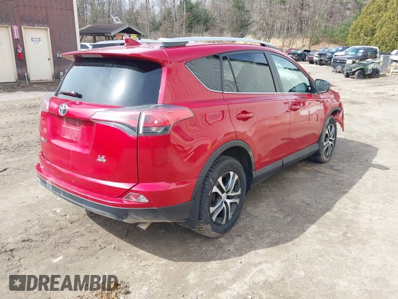2016 Toyota RAV4 LE with VIN 2T3BFREV7GW517043, listed as a IAAI auction lot 41828999 with 103,587 mi miles. Bid and sale history available at carsss.com. Image 4.