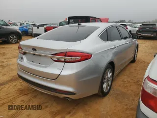 2018 Ford Fusion Energi SE with VIN 3FA6P0PU1JR245038, listed as a Copart auction lot 48672125 with 112,856 mi miles and Clean Title. Bid and sale history available at carsss.com. Image 3.