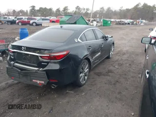 2019 Mazda 6 Grand Touring Reserve with VIN JM1GL1WY6K1505935, listed as a IAAI auction lot 41626078 with 19,000 mi miles and . Bid and sale history available at DreamBid. Image 4.