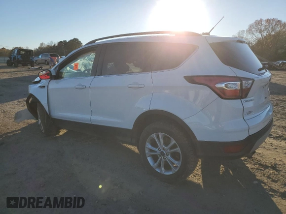 2018 Ford Escape SE z VIN 1FMCU9GD3JUB16376, wystawiony jako Copart lot #83453484 z przebiegiem 163 251 mil mil oraz Szkody całkowita. Historia ofert i sprzedaży dostępna na DreamBid. Obrazek 2.
