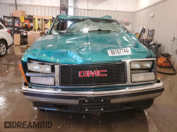 1993 GMC Sierra 1500 z VIN 2GTEK19K8P1562964, wystawiony jako Copart lot #86767744 z przebiegiem 237 615 mil mil oraz Czysty tytuł • Clean title. Historia ofert i sprzedaży dostępna na DreamBid. Obrazek 5.