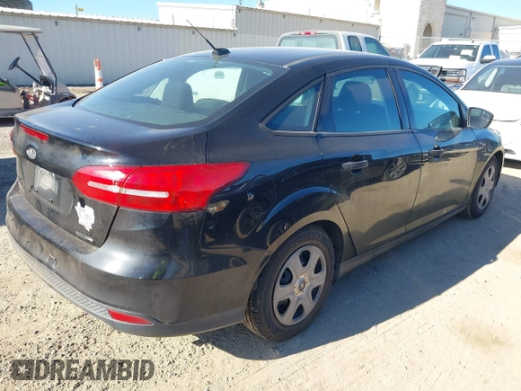 2016 Ford Focus S with VIN 1FADP3E23GL318945, listed as a IAAI auction lot 41640736 with 193,209 mi miles and . Bid and sale history available at carsss.com. Image 4.