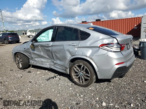 2017 BMW X4 M40i with VIN 5UXXW7C51H0U25511, listed as a Copart auction lot 77492894 with 94,003 mi miles and Salvage Title. Bid and sale history available at carsss.com. Image 2.