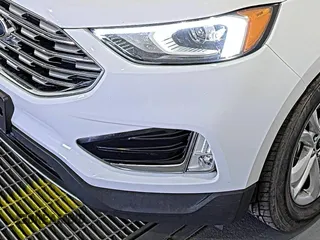 2019 Ford Edge SEL with VIN 2FMPK3J9XKBC37759, listed as a IAAI auction lot 42666643 with 103,812 mi miles and . Bid and sale history available at DreamBid. Image 22.