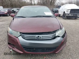 2011 Honda Insight LX z VIN JHMZE2H52BS004304, wystawiony jako IAAI lot #41827541 z przebiegiem 141 072 mil mil oraz . Historia ofert i sprzedaży dostępna na DreamBid. Obrazek 12.