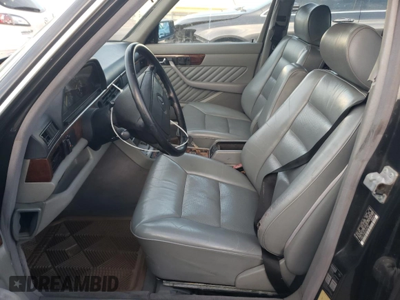 1991 Mercedes-Benz 560 with VIN WDBCA39E8MA567307, listed as a Copart auction lot 77488244 with 202,305 mi miles and Clean Title. Bid and sale history available at DreamBid. Image 7.