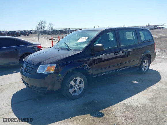 2010 Dodge Grand Caravan SE with VIN 2D4RN4DE6AR297369, listed as a IAAI auction lot 42036741 with 200,298 mi miles. Bid and sale history available at carsss.com. Image 2.