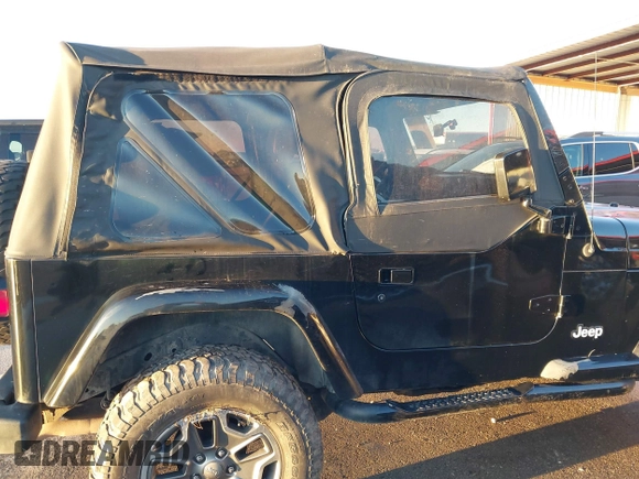 1997 Jeep Wrangler SE with VIN 1J4FY29P0VP415195, listed as a IAAI auction lot 41221078 with 137,046 mi miles. Bid and sale history available at carsss.com. Image 15.