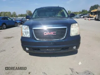2007 GMC Yukon SLT with VIN 1GKFK13057J345796, listed as a Copart auction lot 71773124 with 218,788 mi miles and Salvage Title. Bid and sale history available at carsss.com. Image 5.