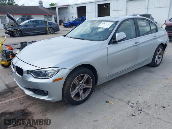 2013 BMW 3 Series 328i with VIN WBA3C1C59DK105001, listed as a IAAI auction lot 41923155 with 73,810 mi miles. Bid and sale history available at carsss.com. Image 2.