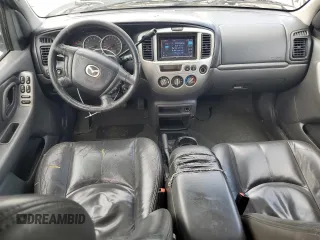 2004 Mazda Tribute ES with VIN 4F2CZ96104KM18818, listed as a Copart auction lot 68863884 with 317,983 mi miles and Salvage Title. Bid and sale history available at carsss.com. Image 8.