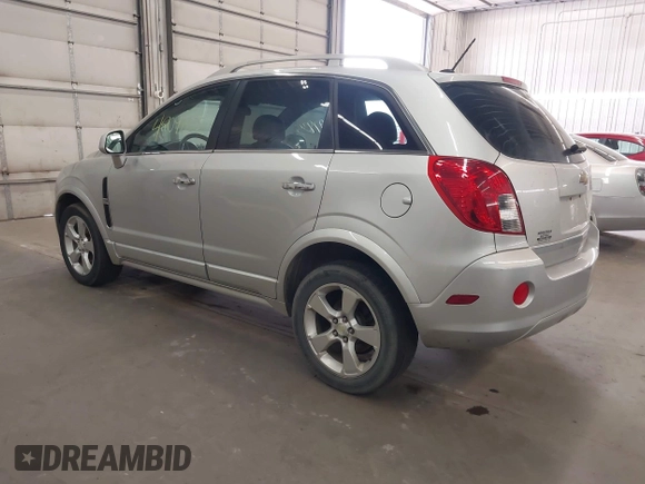 2015 Chevrolet Captiva Sport LT with VIN 3GNAL3EK2FS521222, listed as a IAAI auction lot 42097835 with 128,901 mi miles and . Bid and sale history available at carsss.com. Image 3.