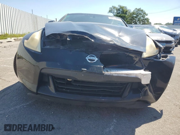 2009 Nissan 370Z Touring with VIN JN1AZ44EX9M407369, listed as a Copart auction lot 66755474 with 124,031 mi miles and Salvage Title. Bid and sale history available at carsss.com. Image 5.