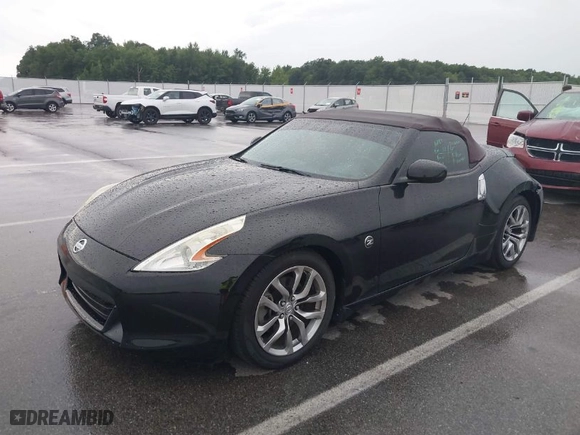 2010 Nissan 370Z Touring with VIN JN1AZ4FH7AM304809, listed as a IAAI auction lot 39876962 with 66,418 mi miles. Bid and sale history available at carsss.com. Image 2.