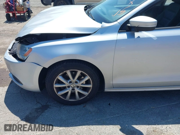 2012 Volkswagen Jetta SE with VIN 3VWDP7AJ8CM465069, listed as a IAAI auction lot 42202597 with 106,963 mi miles and . Bid and sale history available at DreamBid. Image 12.