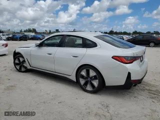 2023 BMW i4 eDrive40 with VIN WBY73AW02PFP79569, listed as a Copart auction lot 70741883 with 9,396 mi miles. Bid and sale history available at carsss.com. Image 2.