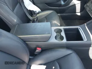 2023 Tesla Model 3 with VIN 5YJ3E1EA1PF431190, listed as a IAAI auction lot 41980007 with 26,164 mi miles and . Bid and sale history available at DreamBid. Image 18.